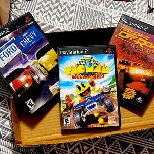 PlayStation 2 games: PAC-MAN, FORD VS. CHEVY, TEST DRIVE OFF-ROAD WIDE OPEN.
